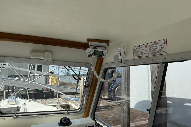 Slide: The Image of Interior view of a 2020 Eastern 248 Islander boat with navigation equipment. - 6