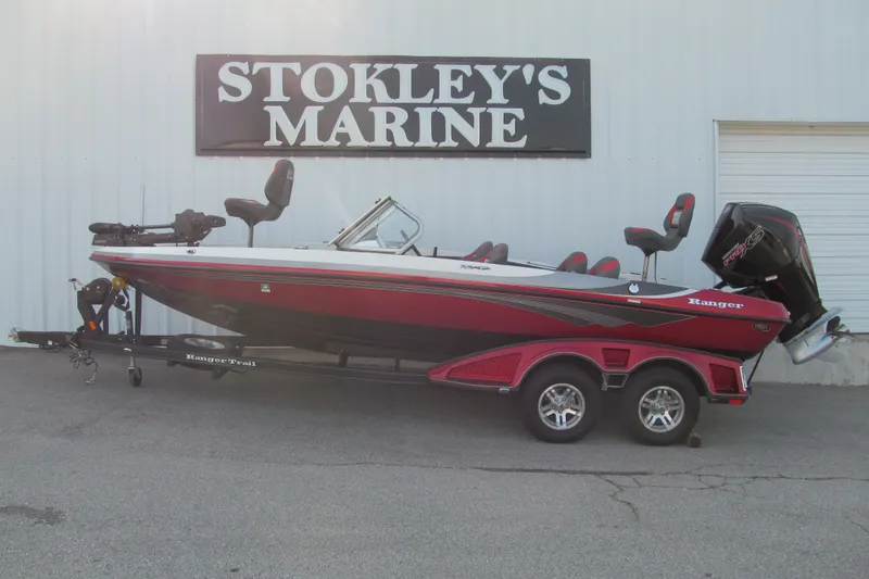 The Image of 2024 Ranger 212LS boat in red, displayed at Stokley's Marine dealership. - 1