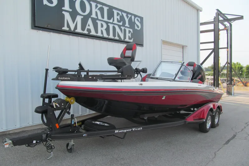 Slide: The Image of 2024 Ranger 212LS boat on trailer at Stokley's Marine dealership. - 2