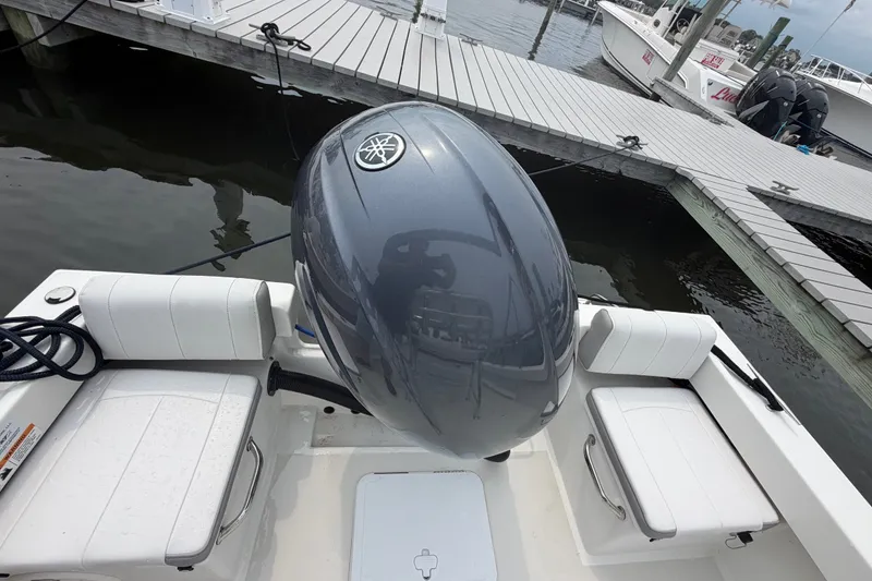 Slide: The Image of 2024 Parker 1801 Center Console boat with Yamaha outboard motor at dock. - 22