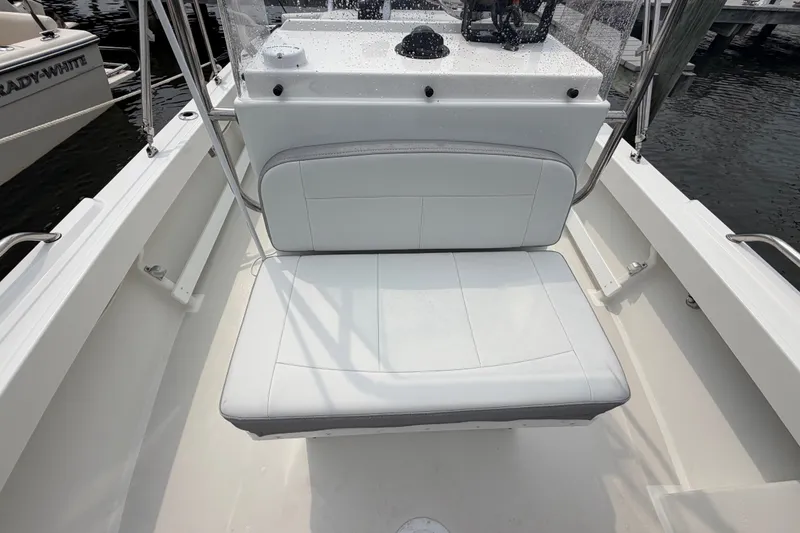 Slide: The Image of 2024 Parker 1801 Center Console boat interior with cushioned seating and console. - 9