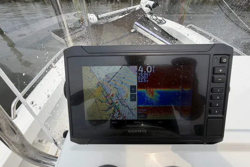 Slide: The Image of Garmin navigation display on 2024 Parker 1801 Center Console boat in rainy conditions. - 15