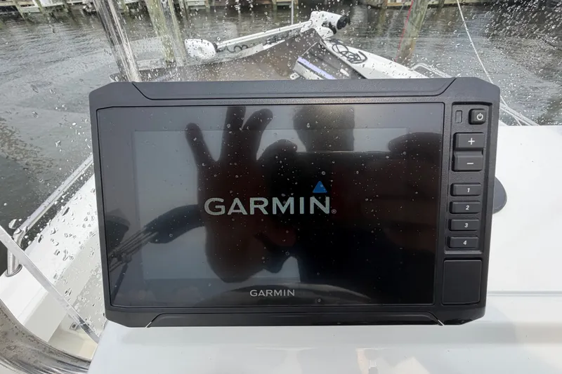 Slide: The Image of Garmin display on 2024 Parker 1801 Center Console boat, with raindrops on screen. - 14