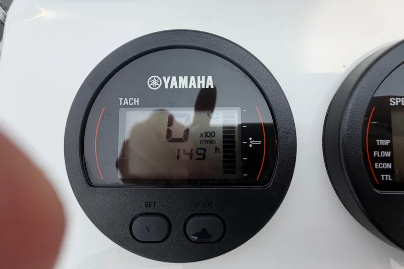 Slide: The Image of Yamaha tachometer on 2024 Parker 1801 Center Console boat, displaying 149 hours. - 18