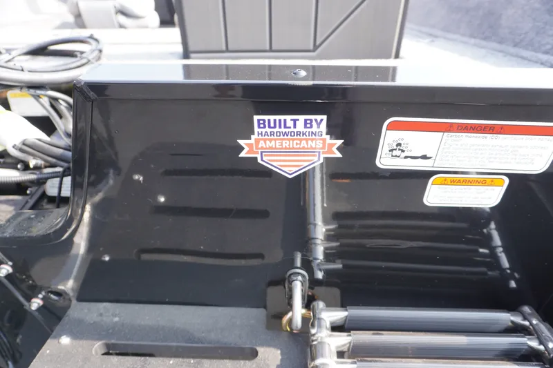 Slide: The Image of 2027 Tracker Pro Guide V-175 Combo boat with "Built by Hardworking Americans" sticker. - 4