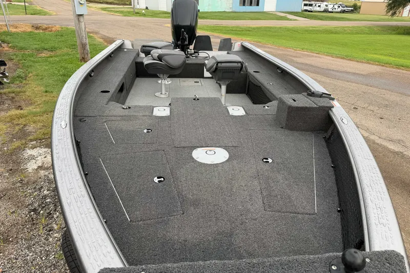 Slide: The Image of 2025 Lund 1875 Pro Guide fishing boat with spacious deck and seating. - 5