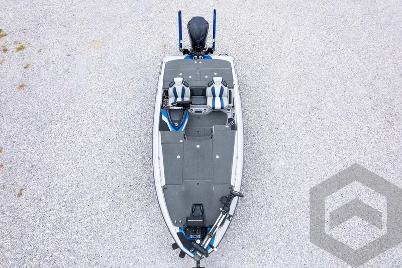 Slide: The Image of 2020 Skeeter FXR20 Limited fishing boat, aerial view, on gravel surface. - 34