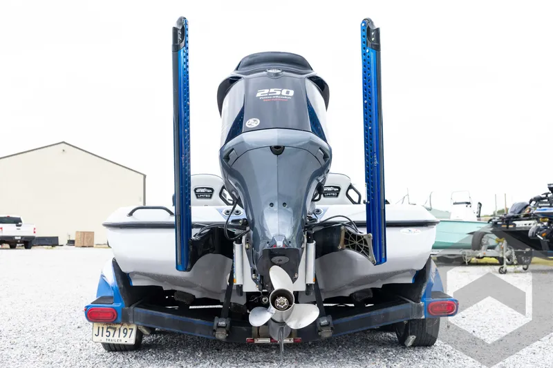 Slide: The Image of 2020 Skeeter FXR20 Limited boat rear view with powerful outboard motor. - 6
