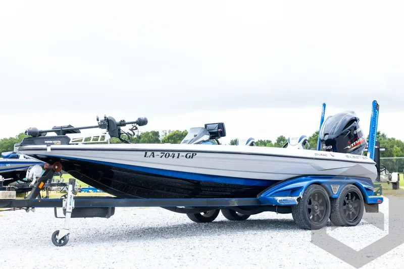 The Image of 2020 Skeeter FXR20 Limited boat on trailer, featuring sleek design and Yamaha motor. - 1