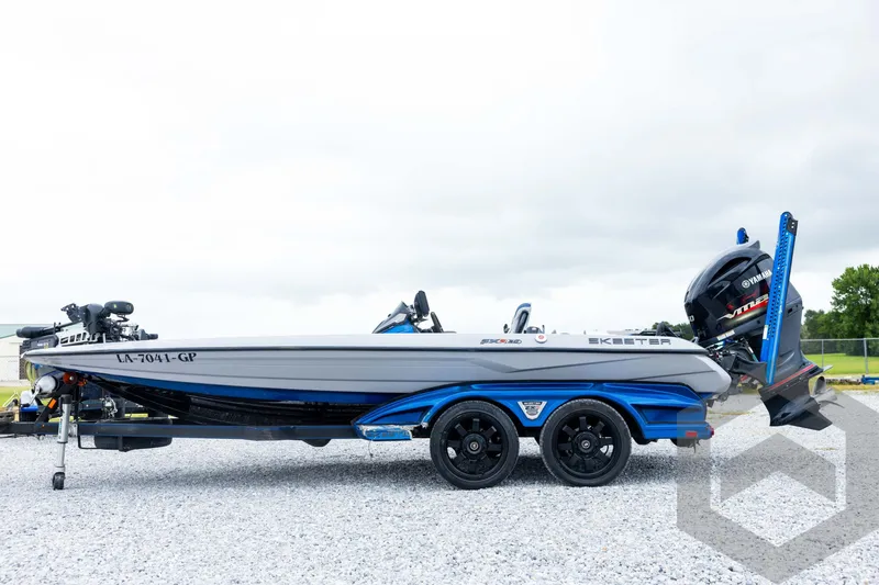 Slide: The Image of 2020 Skeeter FXR20 Limited boat with Yamaha engine on a trailer. - 8