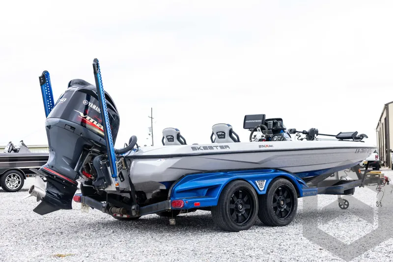 Slide: The Image of 2020 Skeeter FXR20 Limited boat with Yamaha engine on a trailer. - 5