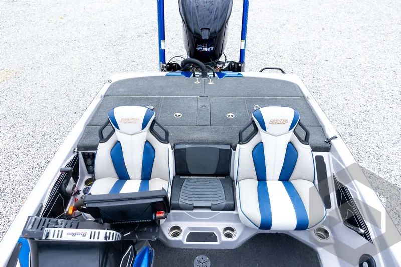 Slide: The Image of 2020 Skeeter FXR20 Limited boat interior with dual blue and white seats. - 23