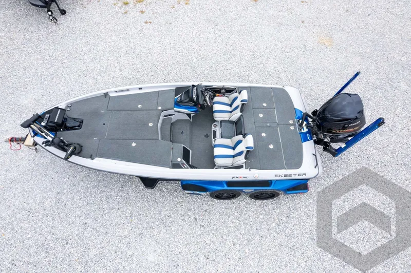 Slide: The Image of 2020 Skeeter FXR20 Limited fishing boat, aerial view, featuring dual seats and Yamaha outboard motor. - 32
