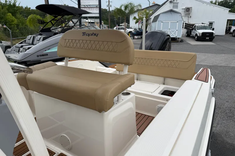 Slide: The Image of 2022 Bayliner Trophy T20CX boat interior with tan seating and modern design. - 4