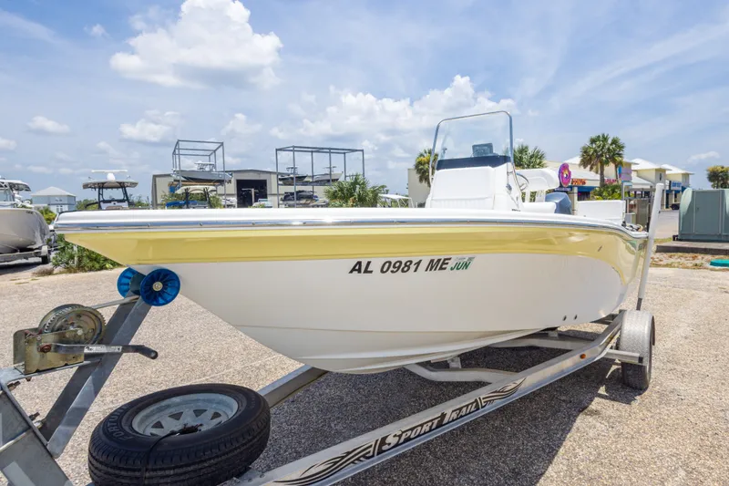 Slide: The Image of 2012 Sea Fox 180 Viper boat on trailer under a sunny sky. - 15