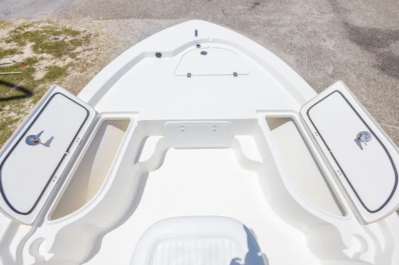 Slide: The Image of 2012 Sea Fox 180 Viper boat with open storage compartments on deck. - 25