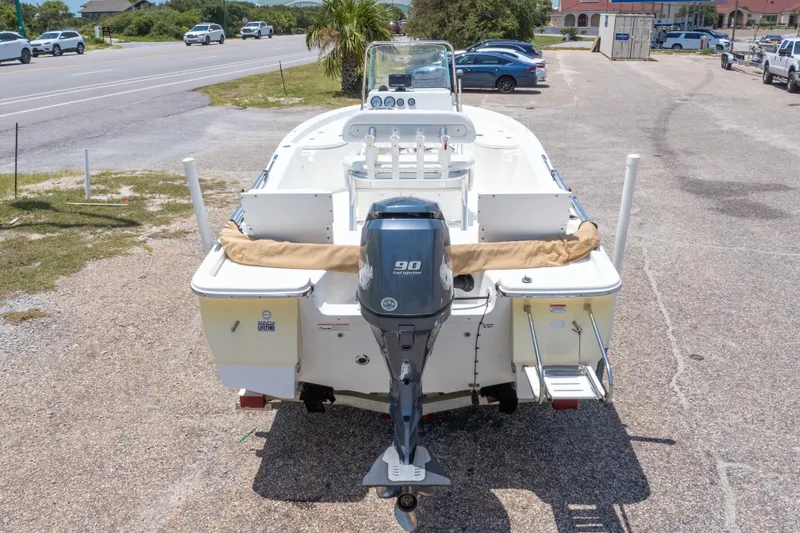 Slide: The Image of 2012 Sea Fox 180 Viper boat with Yamaha 90 engine, parked on a sunny day. - 38