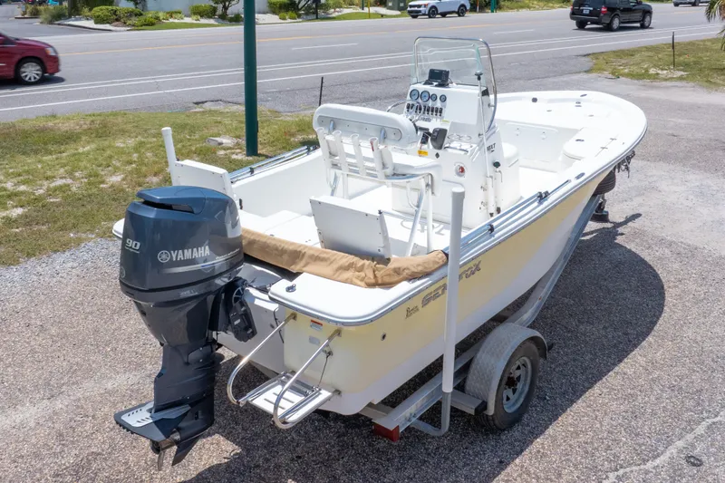 Slide: The Image of 2012 Sea Fox 180 Viper boat with Yamaha 90 engine on trailer, parked roadside. - 37