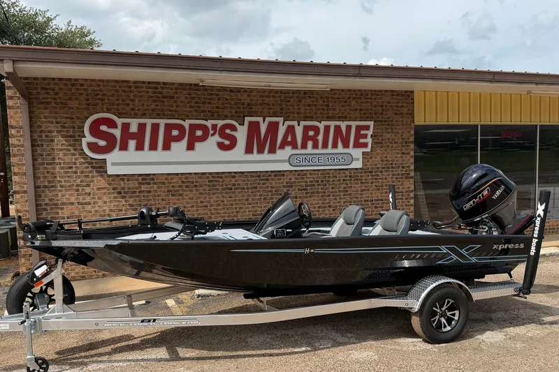 Slide: The Image of 2027 Xpress H18C Crappie boat at Shipp's Marine dealership. - 2
