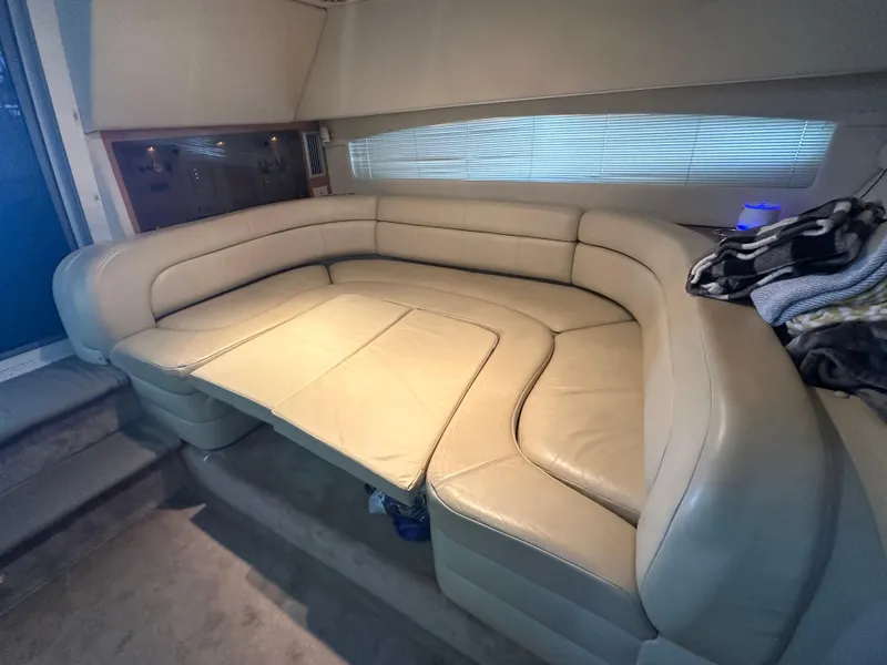Slide: The Image of Luxurious beige leather seating in 2001 Regal Commodore 3780 yacht interior. - 34