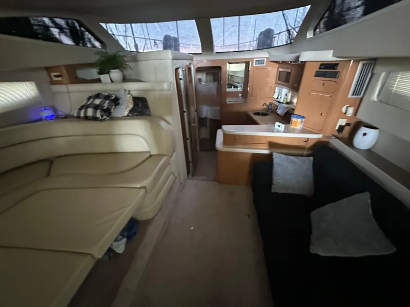 Slide: The Image of Interior of 2001 Regal Commodore 3780 yacht with cozy seating and modern amenities. - 30