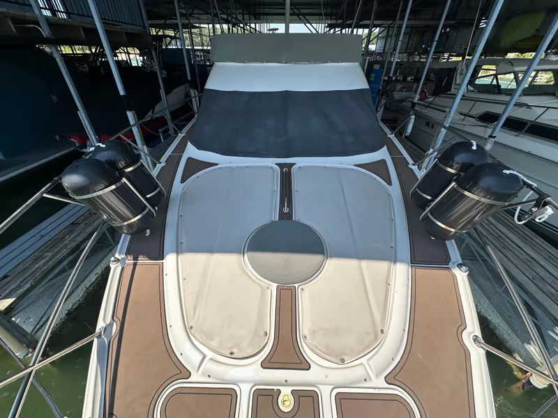 Slide: The Image of 2001 Regal Commodore 3780 yacht docked in marina, top deck view. - 25