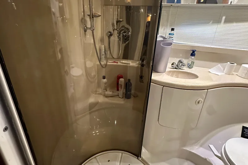 Slide: The Image of Bathroom interior of 2001 Regal Commodore 3780 yacht with shower and sink. - 47