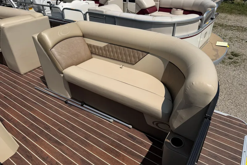 Slide: The Image of Luxurious seating on 2019 Crest II 230 SL pontoon boat with elegant wood flooring. - 4