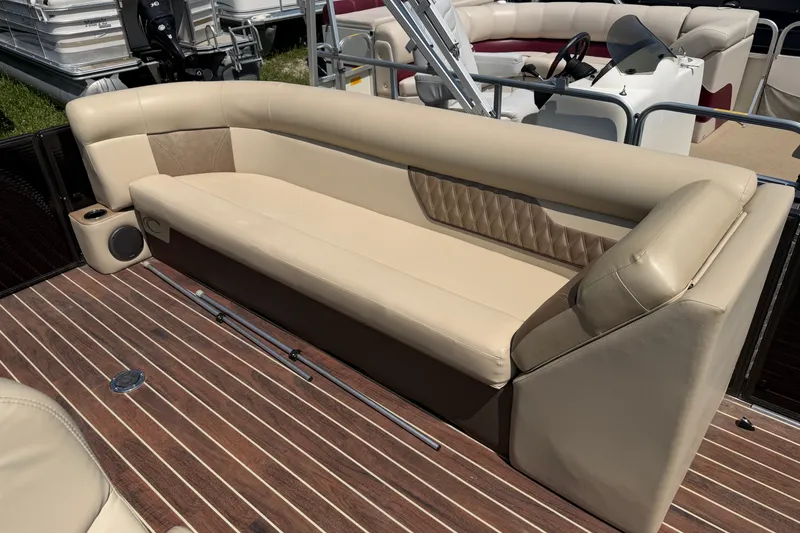 Slide: The Image of Luxurious seating on 2019 Crest II 230 SL pontoon boat with elegant beige upholstery. - 9