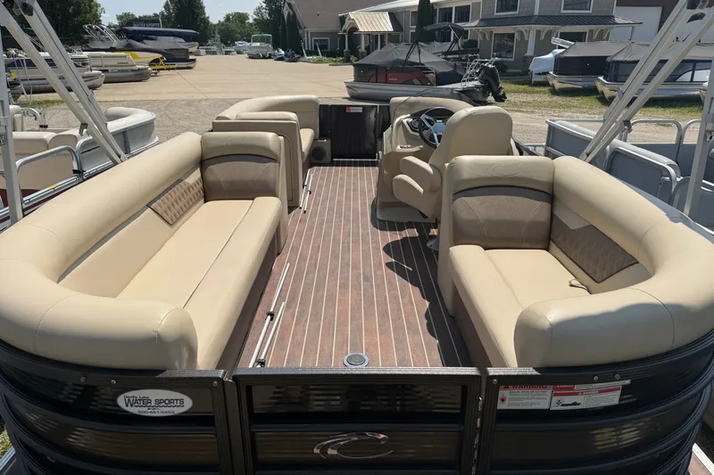 Slide: The Image of 2019 Crest II 230 SL pontoon boat with spacious seating and elegant interior design. - 11