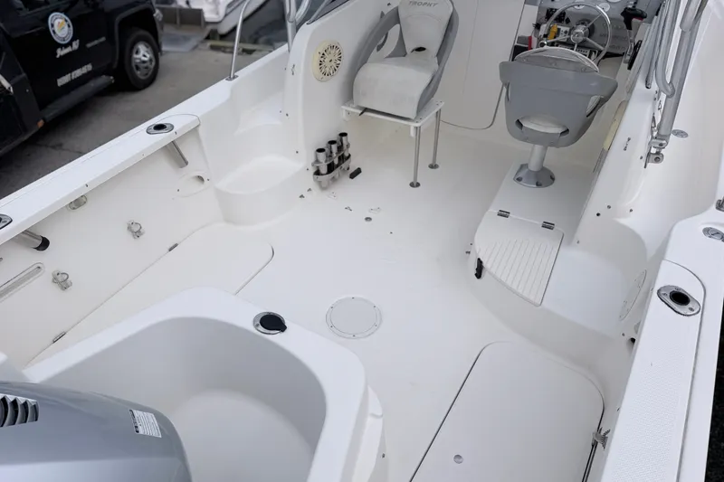 Slide: The Image of 2007 Trophy 2002 Walkaround boat interior with seating and steering console. - 7