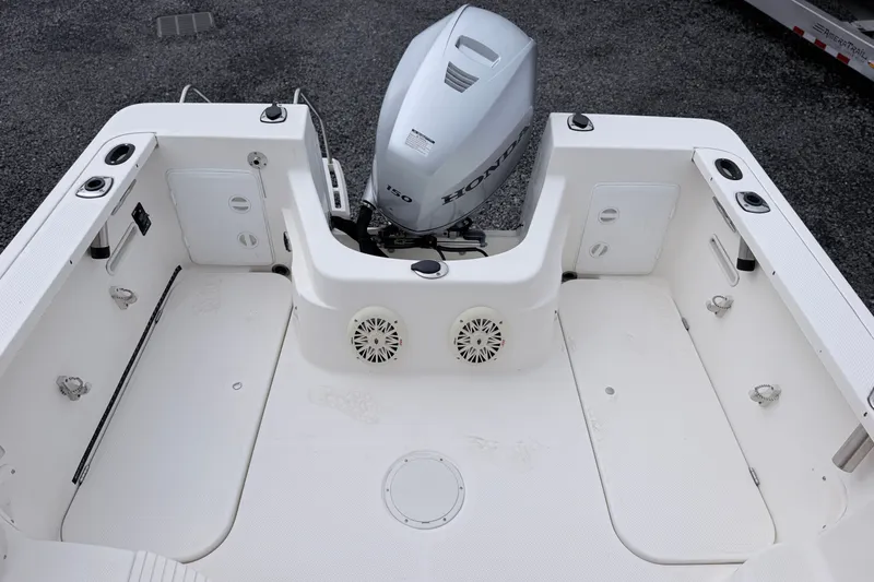 Slide: The Image of 2007 Trophy 2002 Walkaround boat deck with Honda outboard motor. - 9