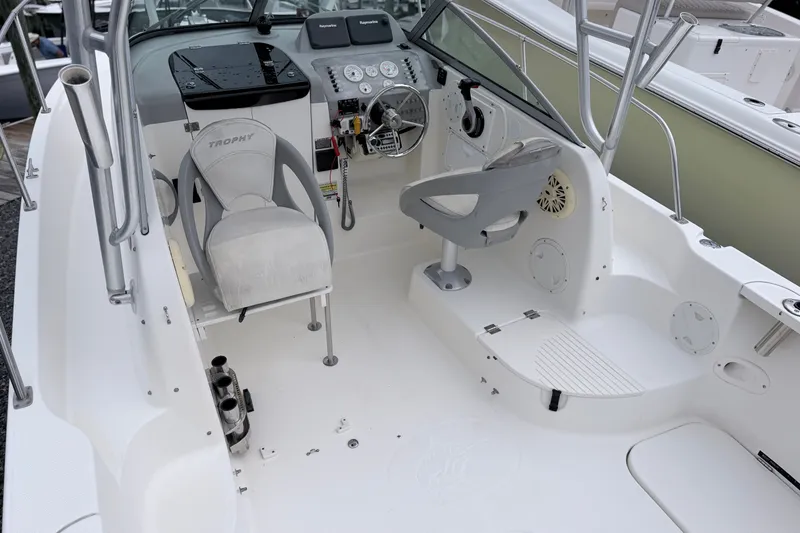 Slide: The Image of 2007 Trophy 2002 Walkaround boat interior with steering console and seating. - 8