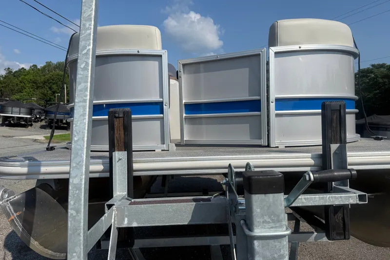 Slide: The Image of 2024 Sylvan Mirage 820 LZ pontoon boat on trailer, sunny day. - 5
