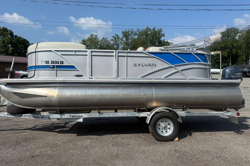 The Image of 2024 Sylvan Mirage 820 LZ pontoon boat on trailer, side view. - 0