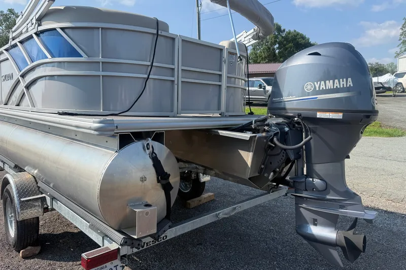 Slide: The Image of 2024 Sylvan Mirage 820 LZ pontoon boat with Yamaha outboard motor on trailer. - 3