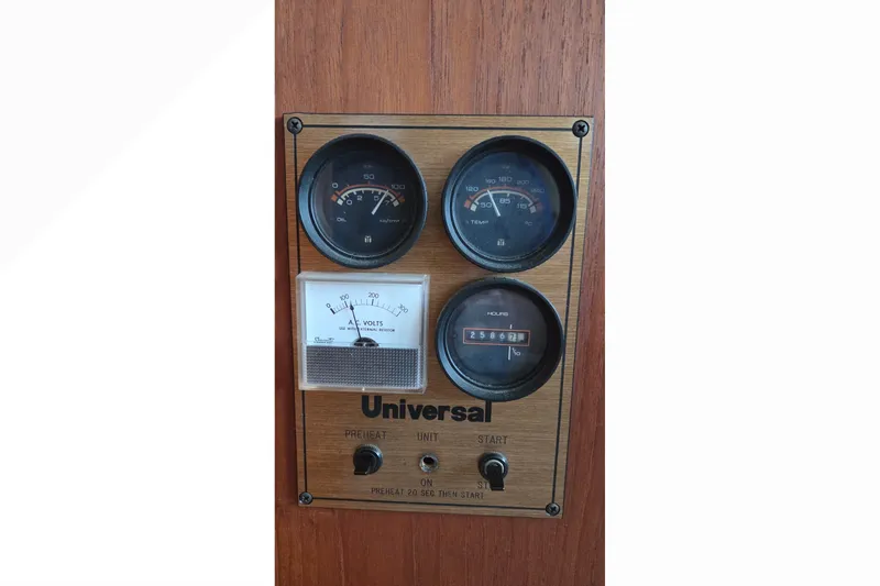 Slide: The Image of Instrument panel of a 1989 Jersey 42 Convertible Sportfisherman boat with gauges and controls. - 20