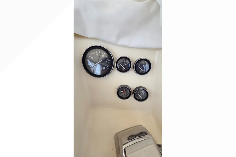 Slide: The Image of Dashboard gauges of a 1989 Jersey 42 Convertible Sportfisherman boat. - 21