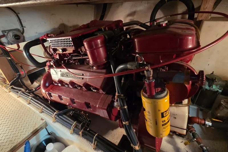 Slide: The Image of Engine room of 1989 Jersey 42 Convertible Sportfisherman with Caterpillar engine. - 26