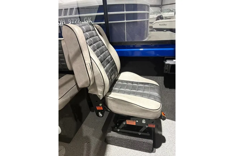 Slide: The Image of 2013 Northwest Boats 228 Lightning Outboard interior seat, featuring gray and black upholstery. - 14