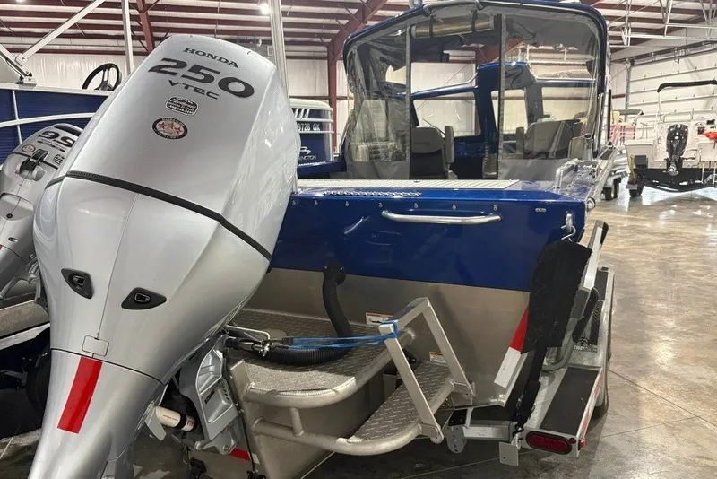 Slide: The Image of 2013 Northwest Boats 228 Lightning Outboard with Honda 250 VTEC engine in showroom. - 10