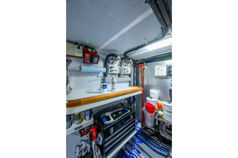 Slide: The Image of Engine room workbench and dual Racor fuel filters for the starboard engine - 65