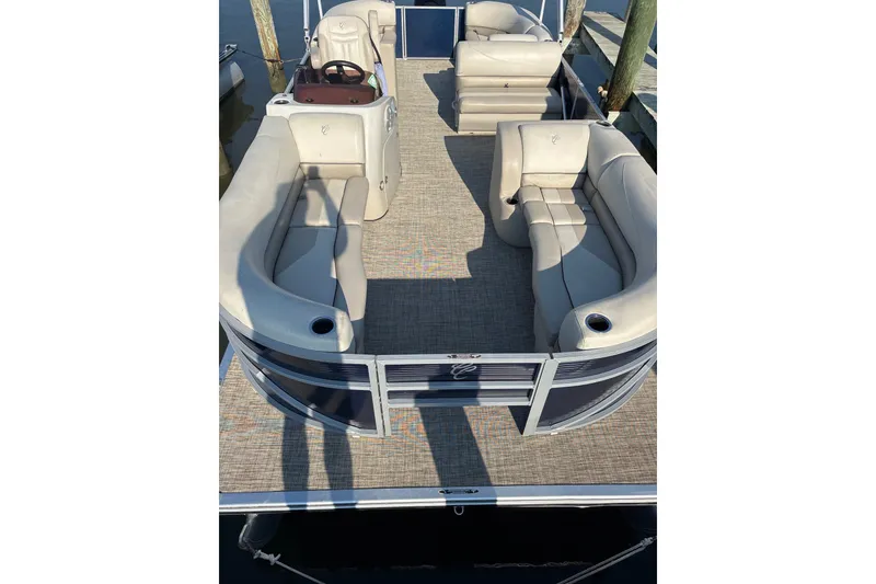 Slide: The Image of 2023 Cypress Cay Seabreeze 232 pontoon boat with spacious seating and modern design. - 6