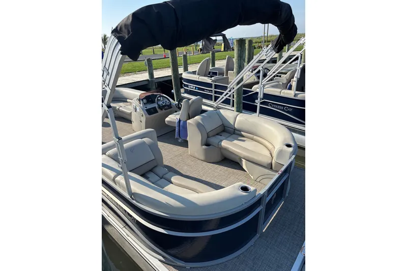 Slide: The Image of 2023 Cypress Cay Seabreeze 232 pontoon boat with spacious seating and canopy. - 4