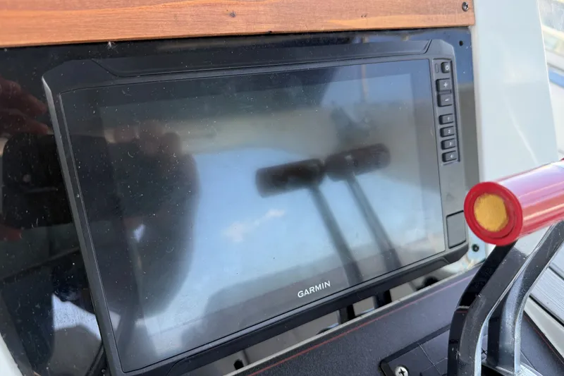 Slide: The Image of Garmin navigation display on 1989 Carver 340 Santego boat dashboard. - 17