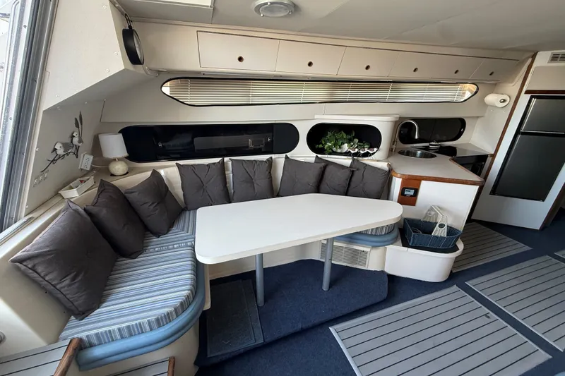 Slide: The Image of Interior of 1989 Carver 340 Santego yacht with cozy seating and modern amenities. - 20