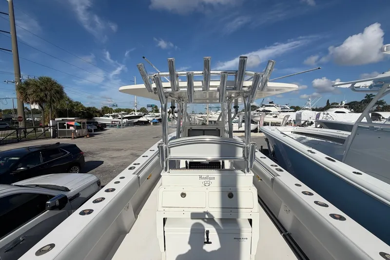 Slide: The Image of 2007 Contender 33 Tournament boat docked under a clear blue sky. - 8