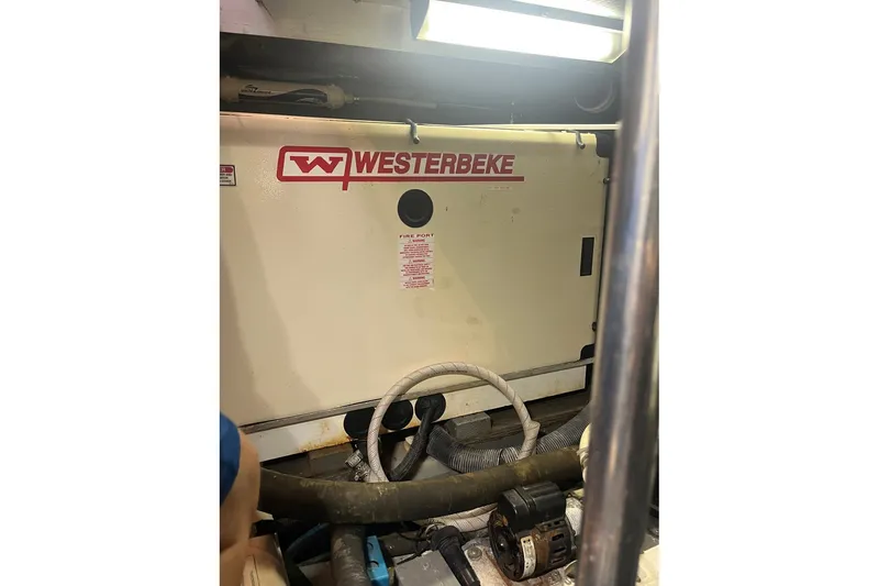 Slide: The Image of Engine room of 2002 Sea Ray 480 Motor Yacht with Westerbeke generator. - 17
