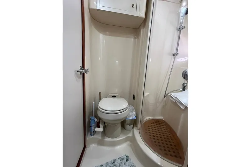 Slide: The Image of Bathroom interior of 2002 Sea Ray 480 Motor Yacht with shower and toilet. - 18