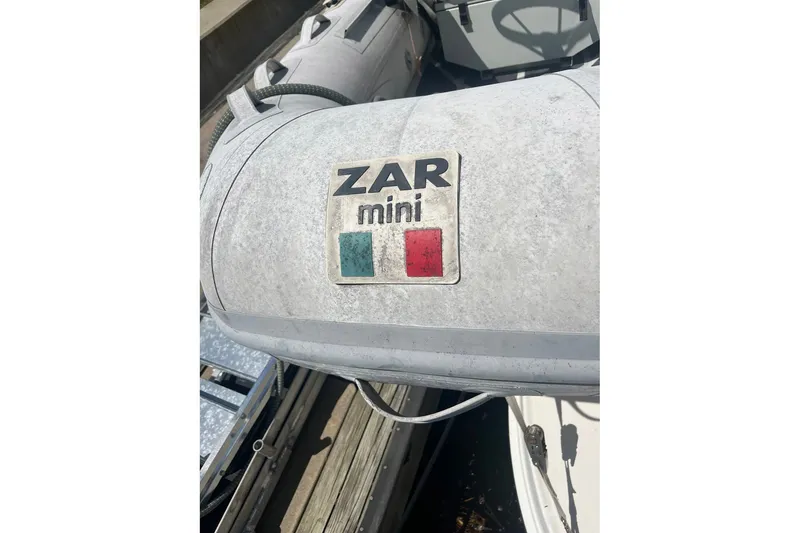 Slide: The Image of ZAR mini inflatable boat on 2002 Sea Ray 480 Motor Yacht deck. - 8